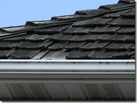 A wood shake roof with Home Inspection reveals a few missing shingles which can allow damage to roof structure.